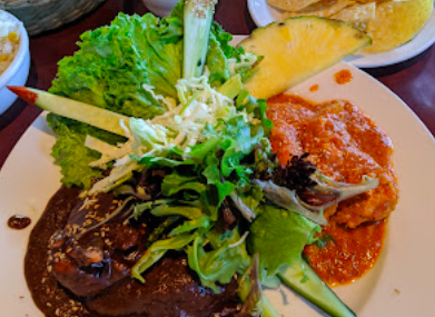 Cafe Poca Cosa signature dishes Mole Negro
Pork Tenderloin in Hibiscus Sauce
Daily Chef Specials